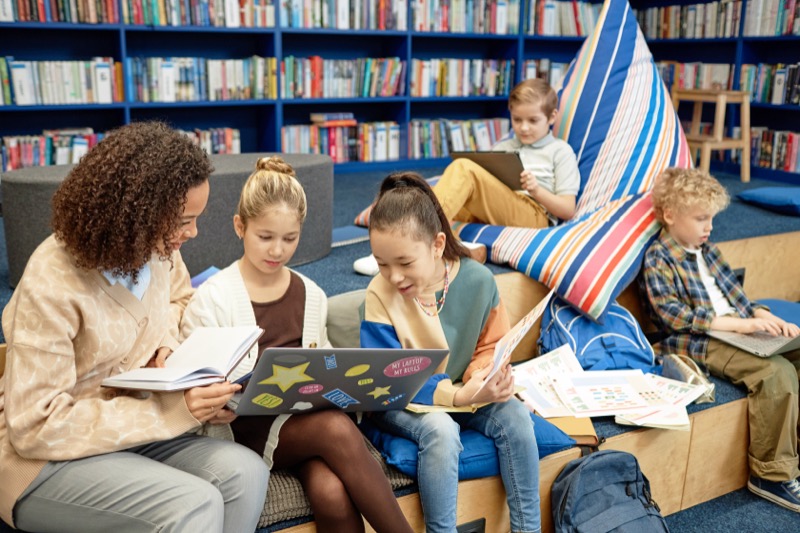 Teens working together at the library